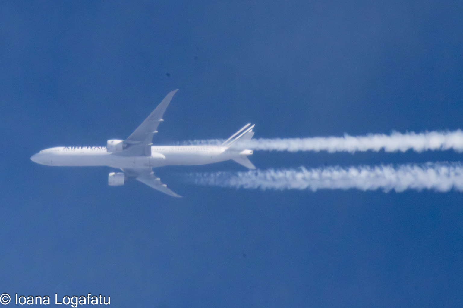 Airborne journey above the clouds in clear skies